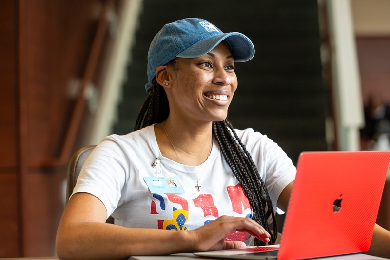 Student sitting at her computer. 