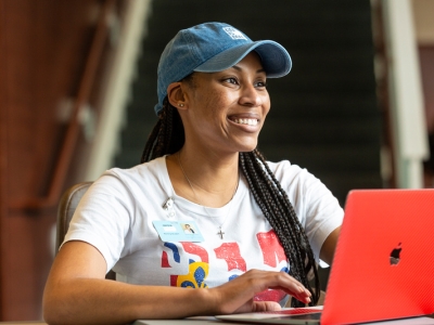 Student sitting at her computer. 